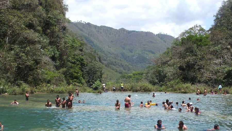 From Lanquin: Semuc Champey Park and Kanba Cave Guided Tour - Entering K’anba Cave: scrambling, water, and guided safety in the underground river